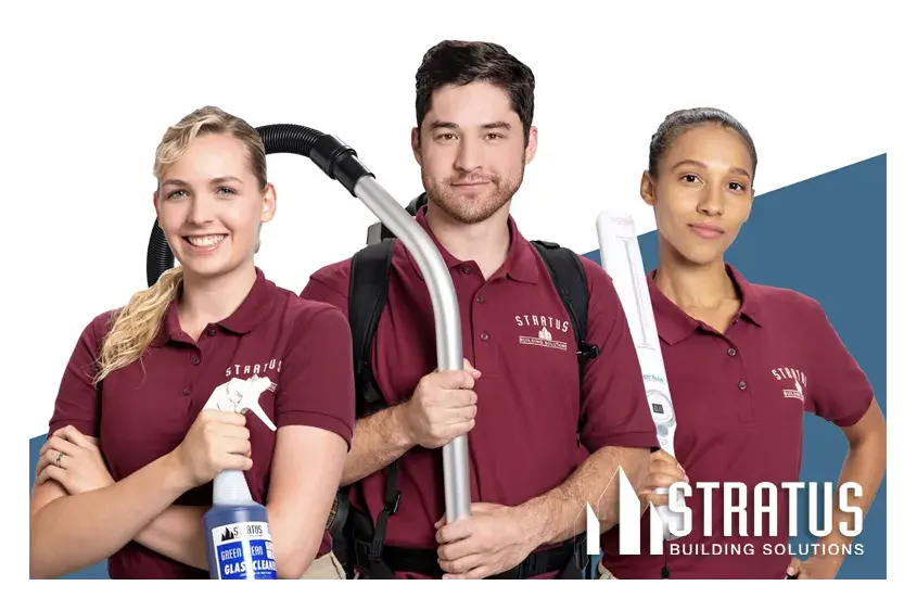 Three Uniformed Stratus Cleaners Side by Side, One with a Spray Bottle, One with a Vacuum Attachment, One with a HEPA Wand